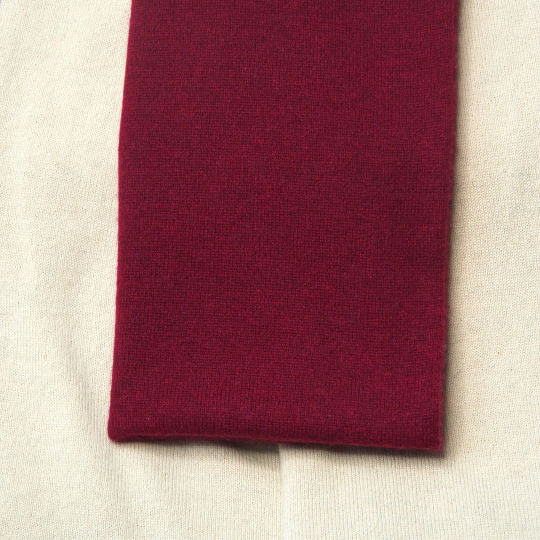 flat lay of men's burgundy cashmere scarf