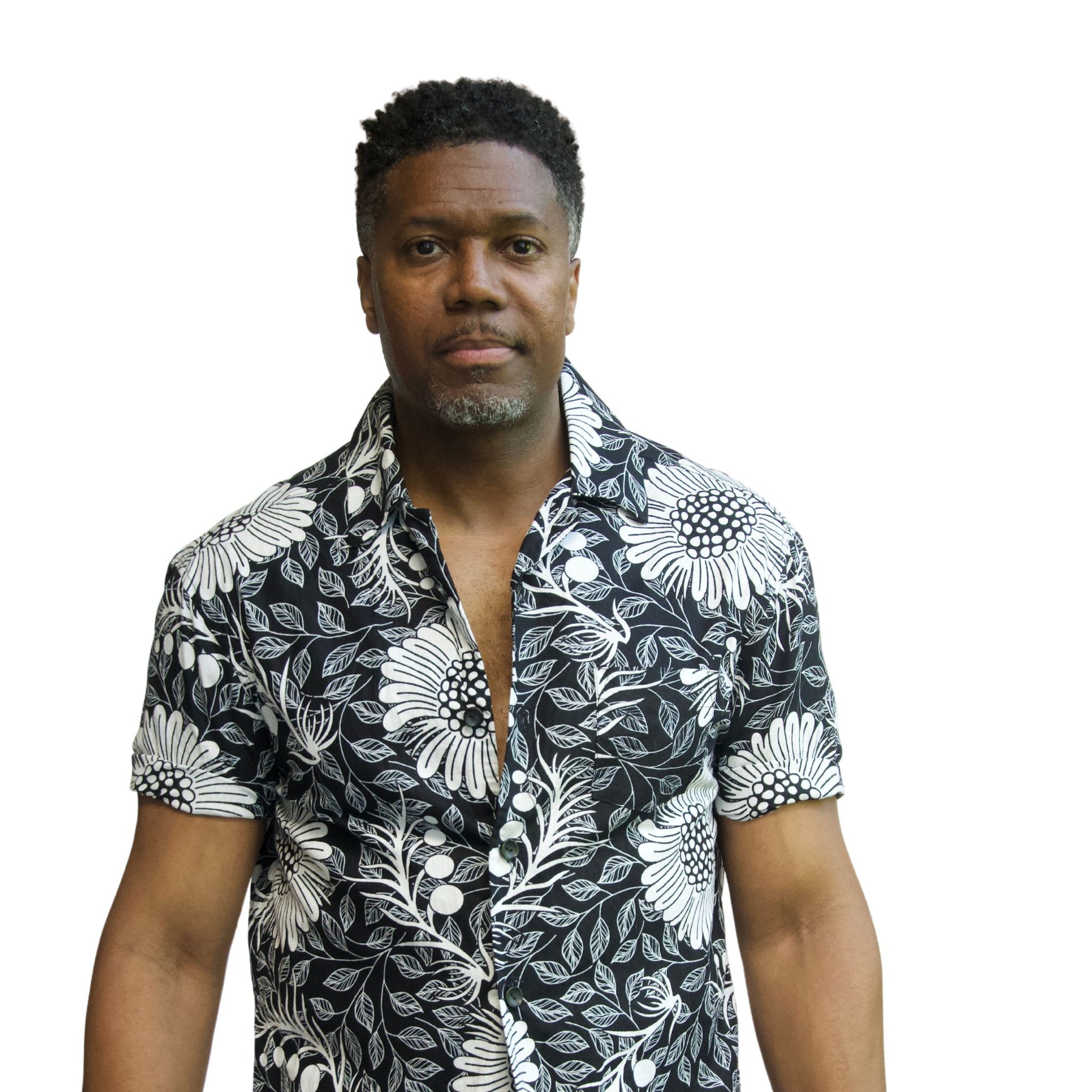 bright black and white floral short sleeve button down men's shirt shown on model