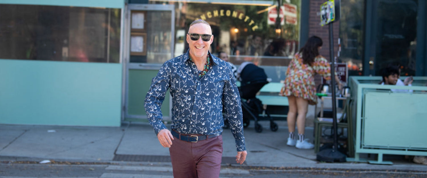 Edwards Buice walking a crosswalk in Chicago