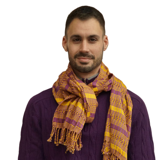 bright men's yellow and purple fringe scarf shown on model