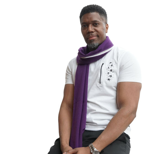 white Polish men's shirt shown on model also wearing a purple scarf.