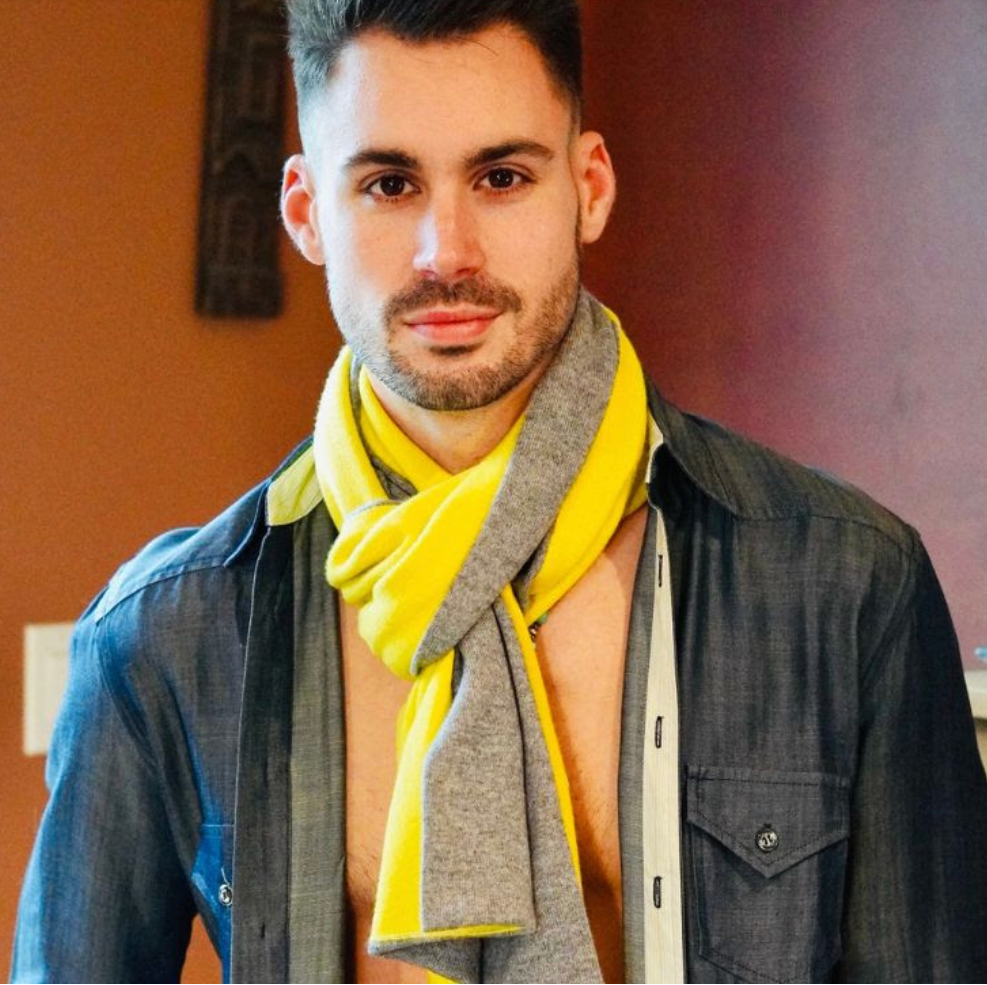 model wearing yellow and gray cashmere scart